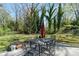 Outdoor patio featuring a dining table with chairs, providing a great spot for outdoor gatherings at 206 23Rd Nw St, Hickory, NC 28601