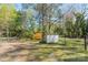 View of two storage sheds in a fenced backyard, offering practical outdoor storage solutions at 206 23Rd Nw St, Hickory, NC 28601