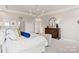 Elegant bedroom features decor, a patterned ceiling and furniture, and two seating chairs at 2212 Indigo Branch Rd, Indian Land, SC 29707