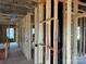 New construction interior framing with ceiling insulation and exposed HVAC system and electrical wires at 2212 Indigo Branch Rd, Indian Land, SC 29707