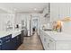Bright kitchen with stainless steel appliances, plenty of counter space, and a large center island with seating at 2212 Indigo Branch Rd, Indian Land, SC 29707
