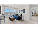 Modern living room with a large window, comfortable seating, and contemporary decor at 2212 Indigo Branch Rd, Indian Land, SC 29707