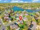 Aerial view of homes at 2610 McHanna Point with a lake, trees, and neighborhood in the background at 2610 Mchanna Pt, Fort Mill, SC 29708