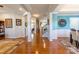 Bright foyer with hardwood floors, elegant columns, and a view of the staircase and dining area at 2610 Mchanna Pt, Fort Mill, SC 29708