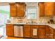Well-equipped kitchen with stainless steel appliances, granite countertops, and ample cabinet space for storage at 2610 Mchanna Pt, Fort Mill, SC 29708