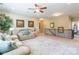 Bright upper living room with elegant decor, plush sofas, and stylish staircase at 2610 Mchanna Pt, Fort Mill, SC 29708