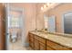 Bathroom featuring a vanity with granite countertop, framed mirror, and toilet at 2731 Laugenour Pl, Kannapolis, NC 28081