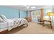 Bedroom with blue walls, 4 poster bed, neutral carpet, and natural light at 2731 Laugenour Pl, Kannapolis, NC 28081