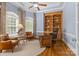 Cozy home office with custom built-ins, hardwood floors, and natural light, perfect for remote work at 2731 Laugenour Pl, Kannapolis, NC 28081