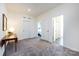 Hallway showcasing carpet, neutral walls, and access to bedrooms and bathroom at 325 Crandon Rd, Mount Holly, NC 28120
