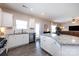 Open kitchen with stainless steel appliances, granite countertops, and a view into a living area at 325 Crandon Rd, Mount Holly, NC 28120