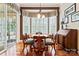 Bright breakfast nook with hardwood floors, plantation shutters, and ample natural light at 331 Miners Cove Way, Fort Mill, SC 29708