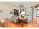Bright living room with hardwood floors, fireplace, and natural light at 331 Miners Cove Way, Fort Mill, SC 29708