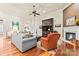 Inviting living room with fireplace and a built-in display cabinet at 331 Miners Cove Way, Fort Mill, SC 29708