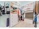 Organized walk-in closet with shelving, drawers, and a cushioned bench at 331 Miners Cove Way, Fort Mill, SC 29708