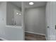 Bright entryway with neutral gray walls and wood-look flooring at 3835 Mohawk Ct, Charlotte, NC 28215