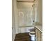 Clean, well-lit bathroom featuring a shower-tub combo and modern fixtures at 3925 Taylorsville Hwy, Statesville, NC 28625