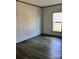 Bright bedroom with hardwood floors and large windows at 3925 Taylorsville Hwy, Statesville, NC 28625