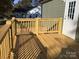 Back deck with a wooden railing at 3925 Taylorsville Hwy, Statesville, NC 28625