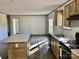 Well-lit kitchen features an island and modern appliances at 3925 Taylorsville Hwy, Statesville, NC 28625