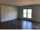 Spacious living room with windows at 3925 Taylorsville Hwy, Statesville, NC 28625