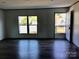 Spacious living room with windows and doorway at 3925 Taylorsville Hwy, Statesville, NC 28625