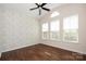 Comfortable bedroom with hardwood floors, neutral paint, and a ceiling fan at 4006 Fall Oak Ter, Fort Mill, SC 29707