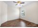 Bright bedroom with ceiling fan and natural light from a single window at 4006 Fall Oak Ter, Fort Mill, SC 29707