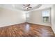 Large bedroom with tray ceiling, ceiling fan, and natural light from two windows at 4006 Fall Oak Ter, Fort Mill, SC 29707