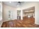Bright dining room view into an open kitchen with an island and stainless steel appliances at 4006 Fall Oak Ter, Fort Mill, SC 29707