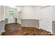 Elegant foyer with hardwood floors, classic wainscoting, and a bright, welcoming entrance at 4006 Fall Oak Ter, Fort Mill, SC 29707