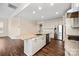 Kitchen island with granite countertop and stainless-steel appliances at 4006 Fall Oak Ter, Fort Mill, SC 29707
