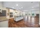 Modern kitchen featuring granite countertops, stainless steel appliances, and an island at 4006 Fall Oak Ter, Fort Mill, SC 29707