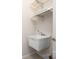 Functional laundry room area featuring a utility sink, a faucet and a shelving unit at 4006 Fall Oak Ter, Fort Mill, SC 29707