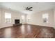 Expansive living space features a stone fireplace and lots of natural light at 4006 Fall Oak Ter, Fort Mill, SC 29707