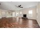 Bright living room with hardwood floors, fireplace, and neutral paint throughout at 4006 Fall Oak Ter, Fort Mill, SC 29707