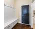 Functional mudroom with built-in bench and storage cabinets at 4006 Fall Oak Ter, Fort Mill, SC 29707