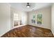 Office space featuring hardwood floors, French doors, and natural light from a large window at 4006 Fall Oak Ter, Fort Mill, SC 29707