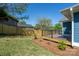 Backyard featuring a new wooden deck, a wooden fence and a well-manicured lawn at 406 Williamson St, Fort Mill, SC 29715