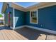 New deck off the side of the house, showcasing the blue siding at 406 Williamson St, Fort Mill, SC 29715