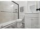 Stylish bathroom showcasing a glass-enclosed shower, toilet, and vanity with sink at 4120 Spring Cove Way, Belmont, NC 28012