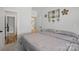 Well-lit bedroom showing doorways to other rooms and neutral decor, offering a calm and connected living space at 4120 Spring Cove Way, Belmont, NC 28012