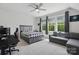 Comfortable bedroom featuring a ceiling fan, bed, and natural light at 4120 Spring Cove Way, Belmont, NC 28012