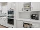 Stylish kitchen offers built-in oven and microwave and additional storage at 4120 Spring Cove Way, Belmont, NC 28012