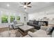 Bright living room with hardwood floors, stylish furniture, and a great view at 4120 Spring Cove Way, Belmont, NC 28012