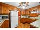 Charming kitchen with classic wood cabinets and vintage appliances at 422 Sherrill Farm Rd, Lincolnton, NC 28092