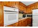 Well-equipped kitchen with built-in oven, range, and ample cabinet space for all your cooking needs at 422 Sherrill Farm Rd, Lincolnton, NC 28092