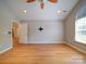Spacious bedroom featuring vaulted ceilings, one window, and wood-look floors at 4754 Polo Gate Blvd, Charlotte, NC 28216