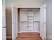 Walk-in closet with built-in shelving and ample hanging space, designed for optimal organization at 4754 Polo Gate Blvd, Charlotte, NC 28216