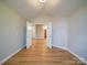 Open room featuring an open door to other parts of the house at 4754 Polo Gate Blvd, Charlotte, NC 28216